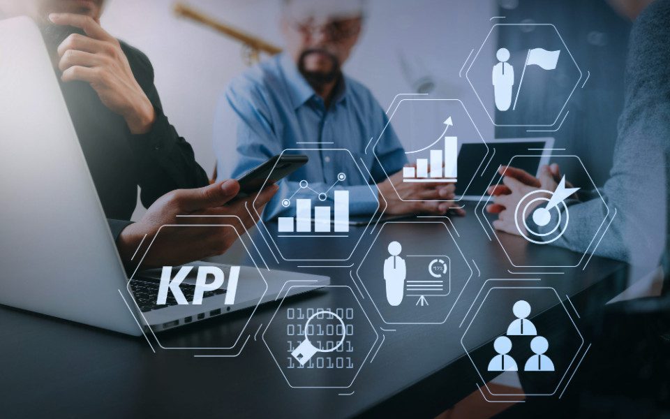 Restaurant owners reviewing marketing KPIs such as bookings, calls and cost per booking
