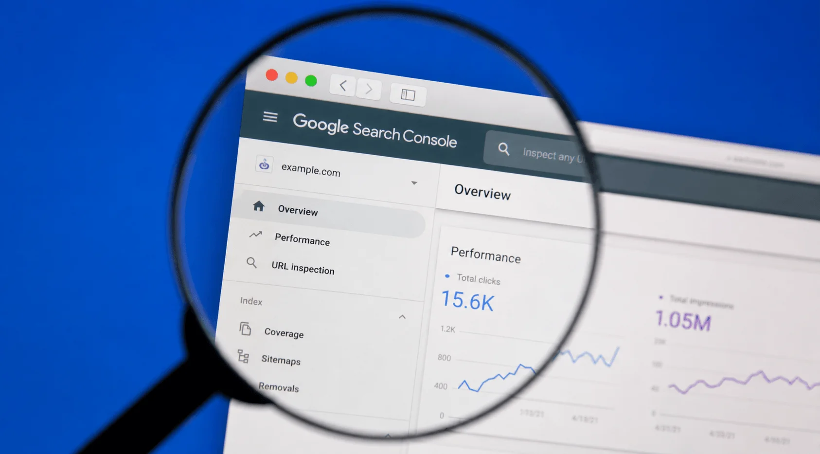 Google Search Console performance overview viewed through a magnifying glass